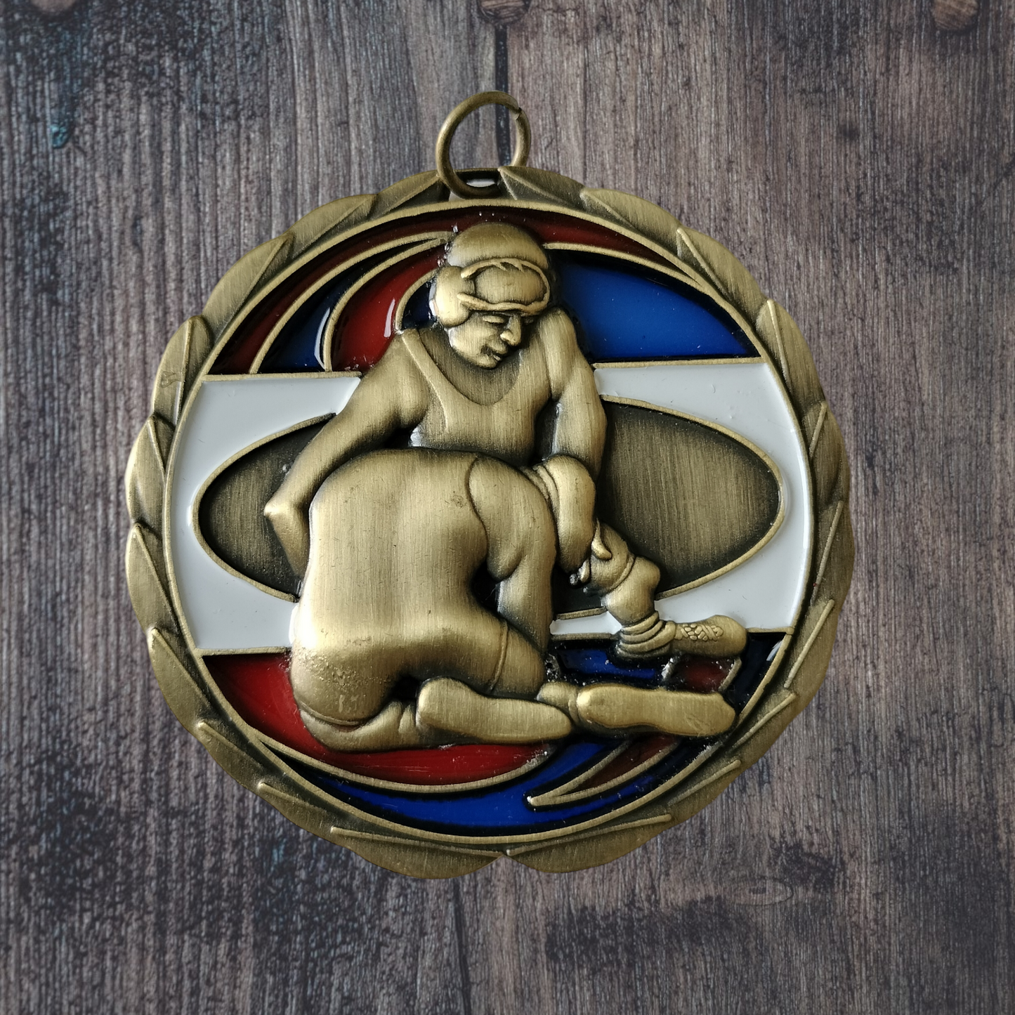 Wrestling medal with resin