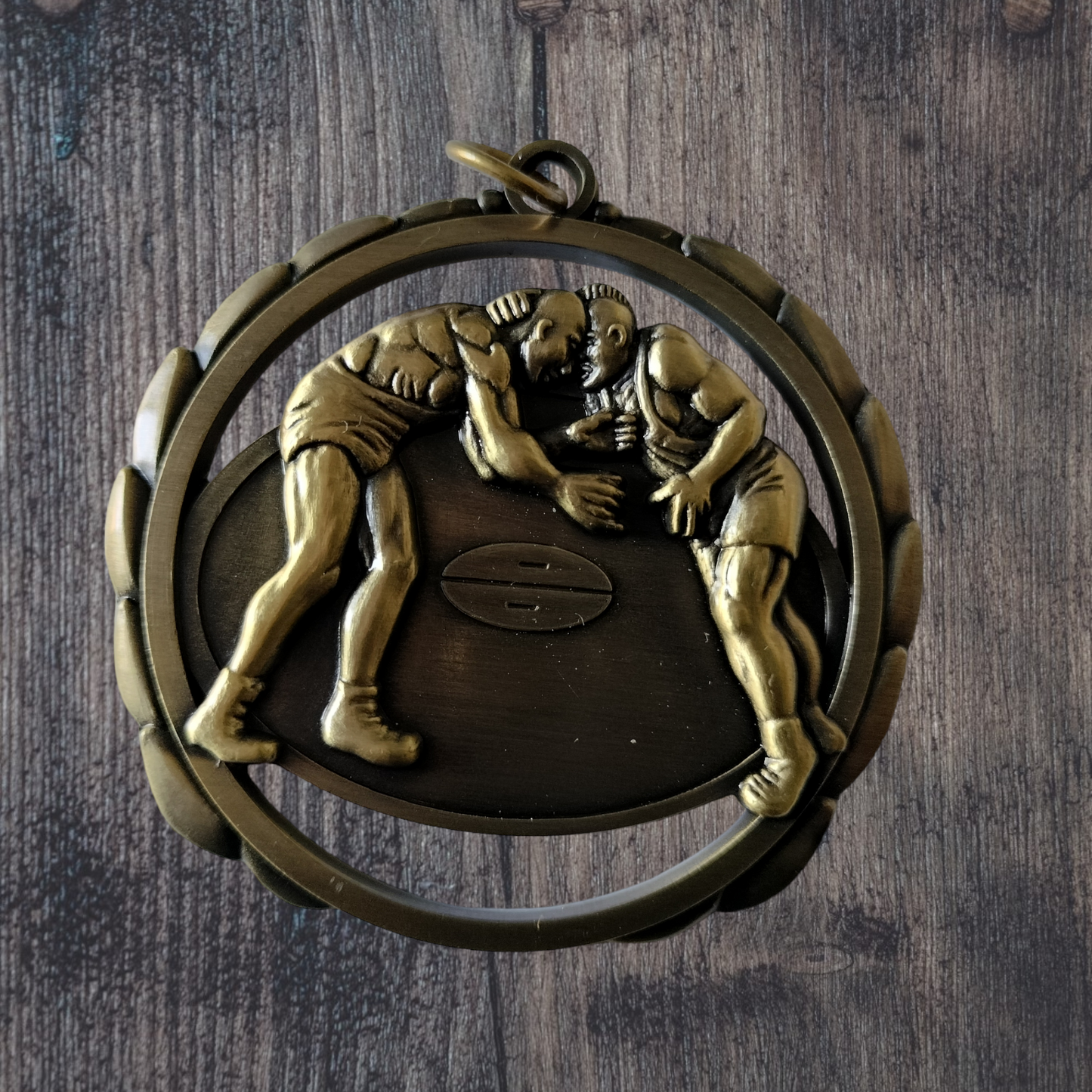Wrestling cutout medal