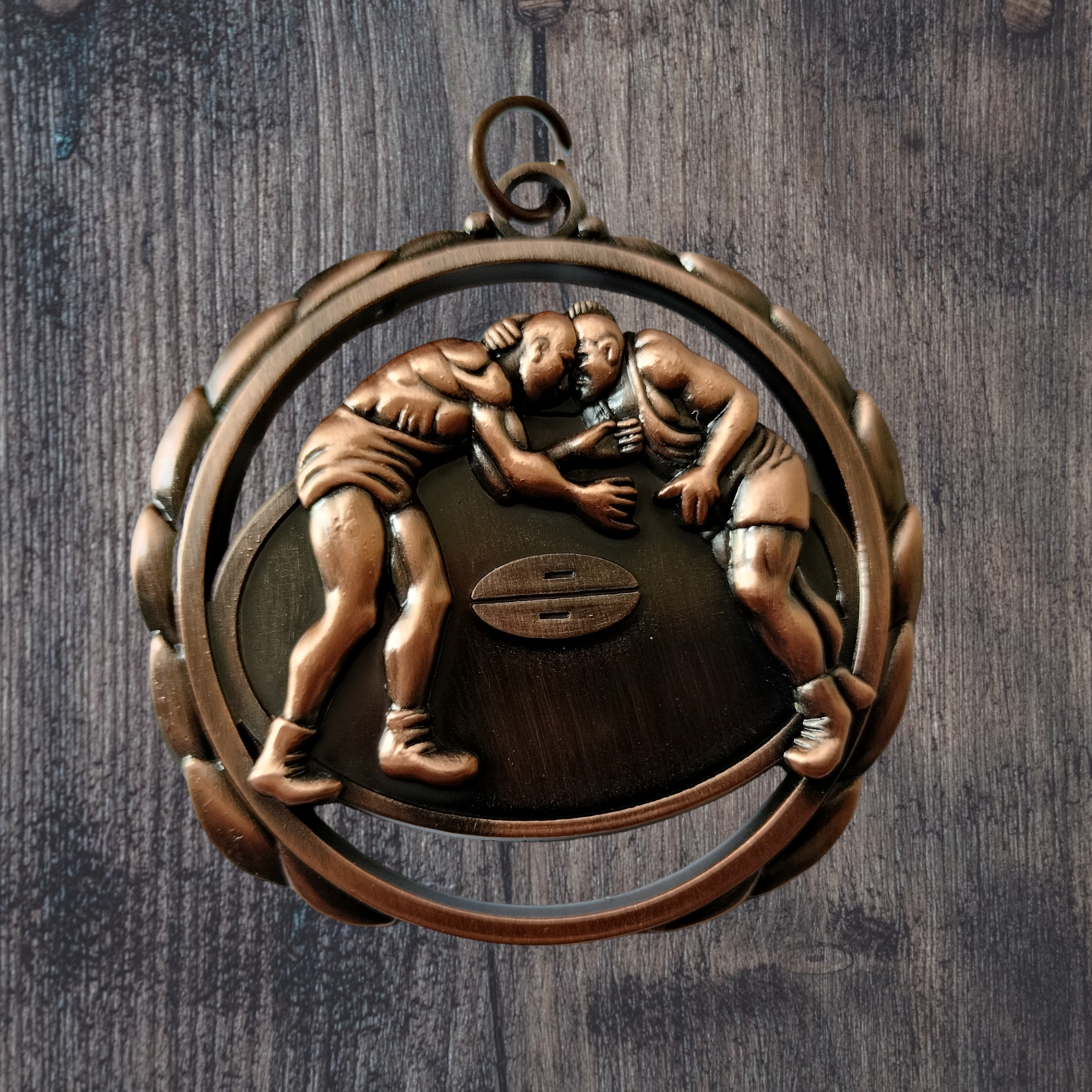 Wrestling cutout medal