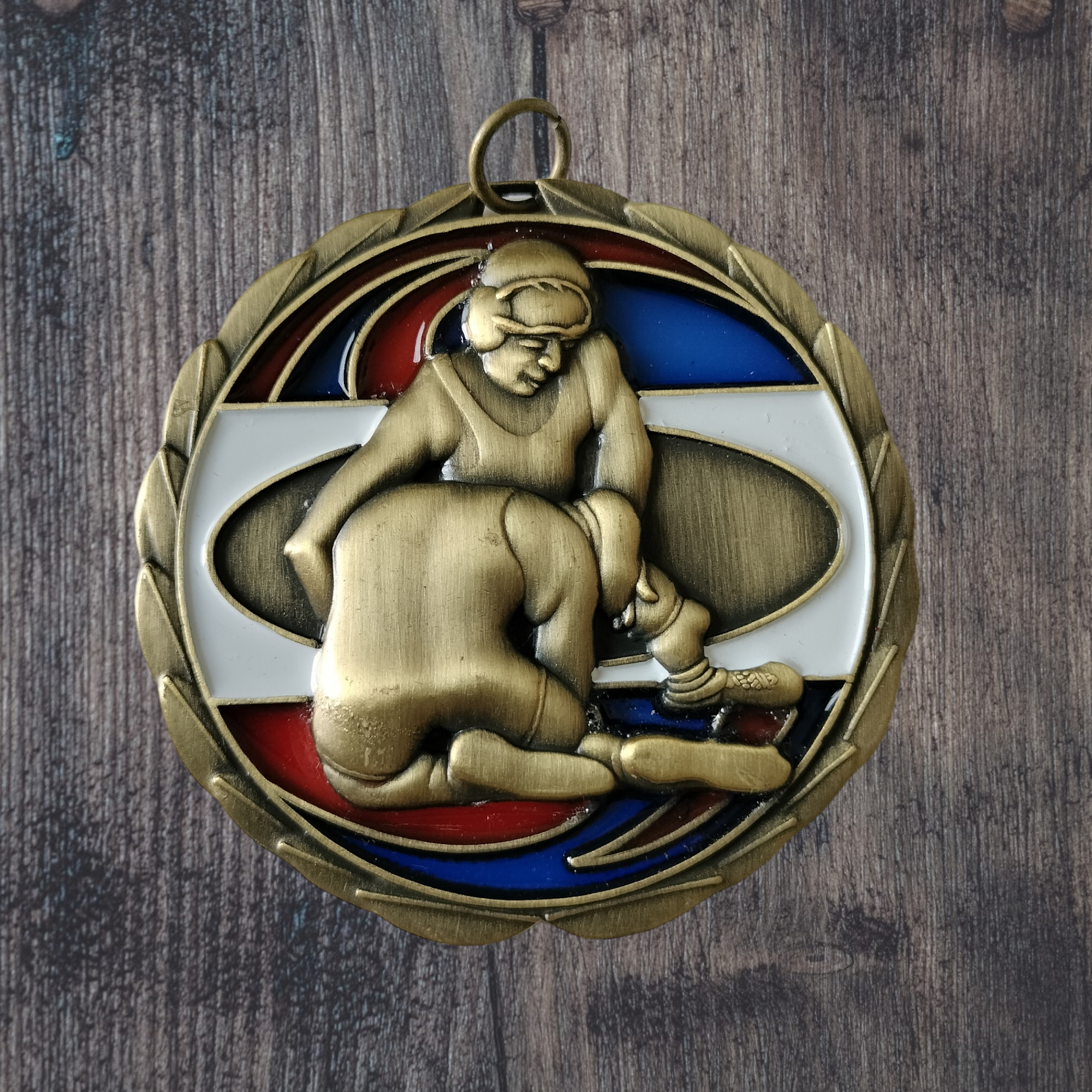 Wrestling medal with resin