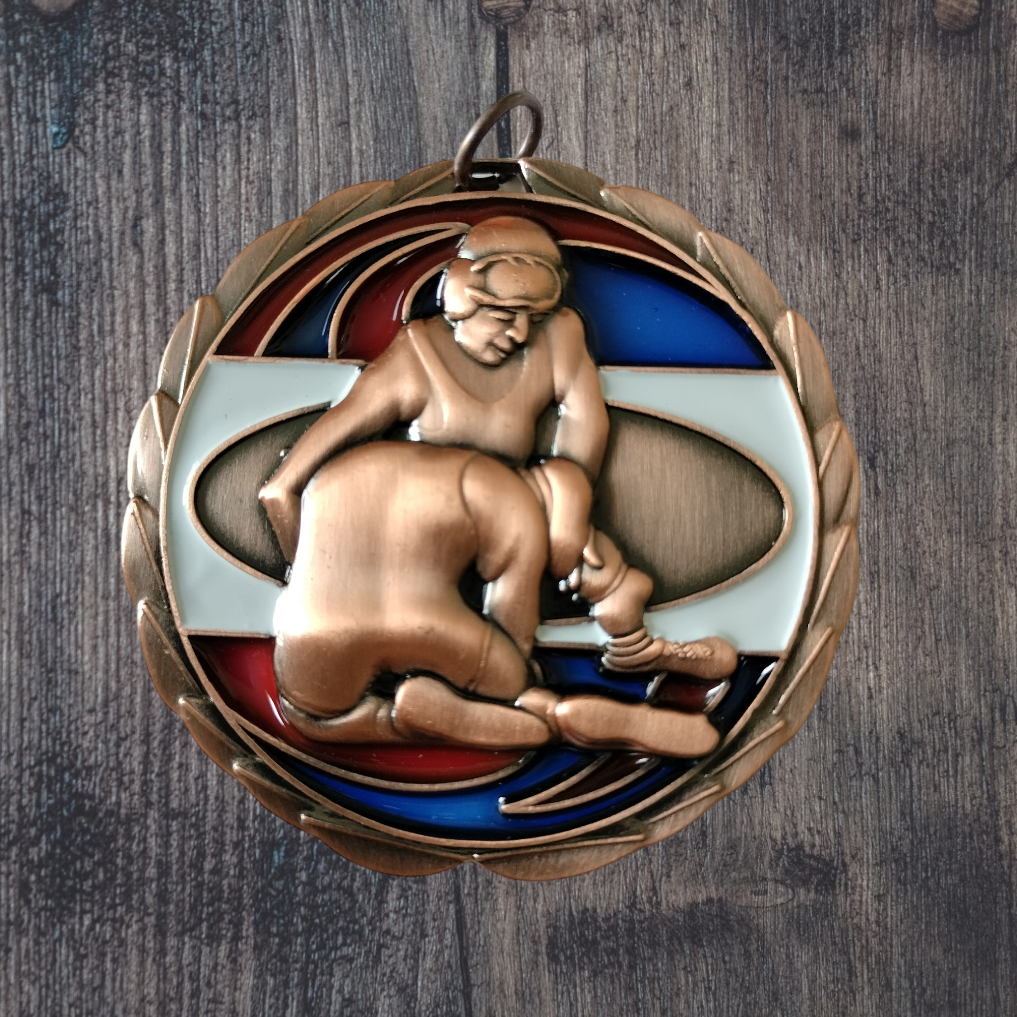 Wrestling medal with resin