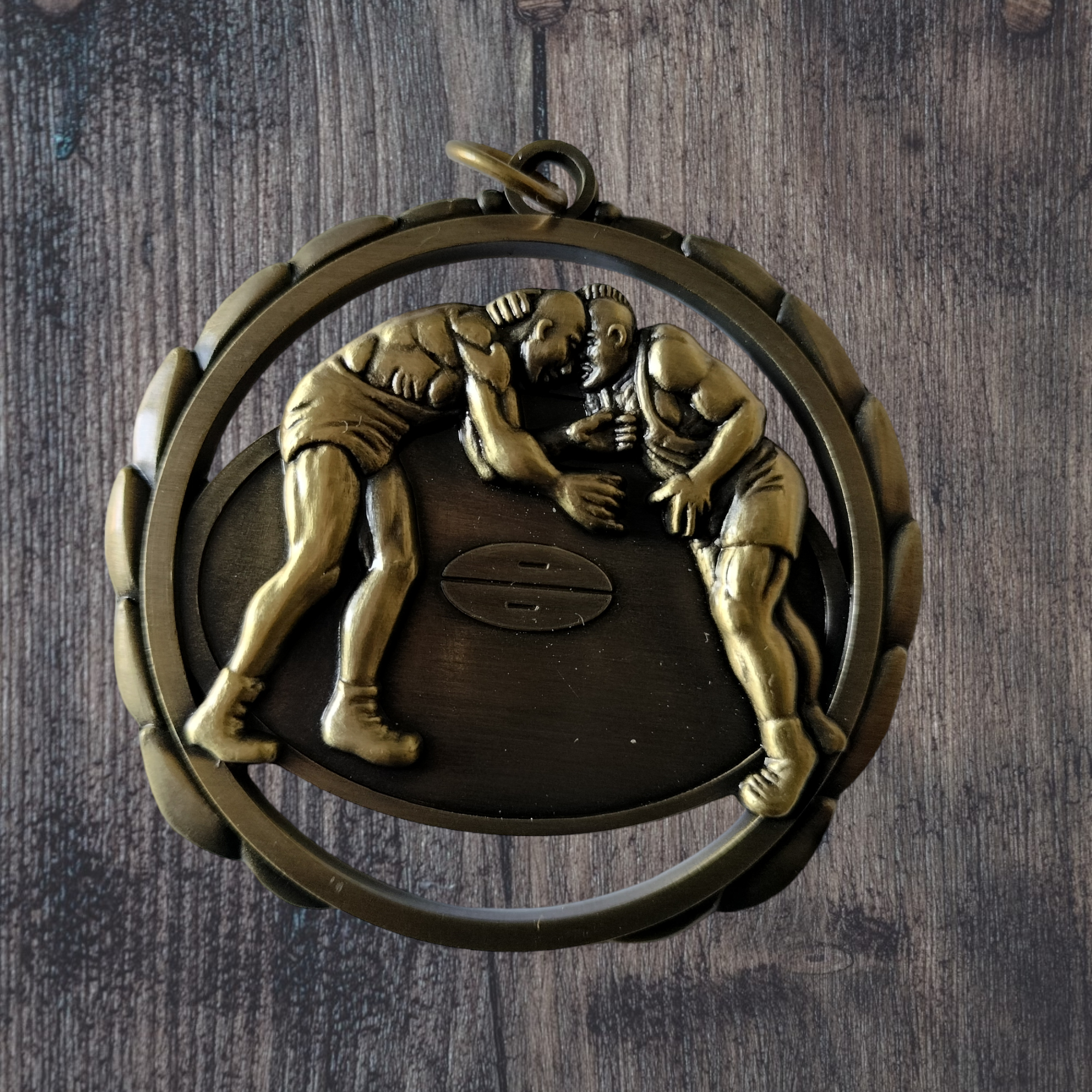 Wrestling cutout medal